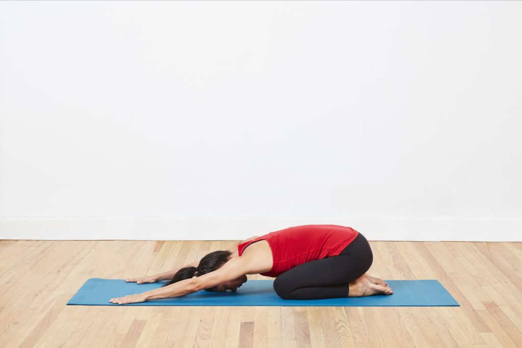 Yoga Poses for Stress Relief- Child's Pose (Balasana) - A Relaxing Posture to Relieve Tension